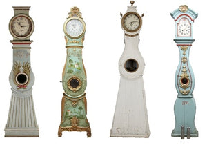 Mora clocks of different designs & colours